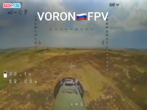  Кадры применения FPV-дрона с установленным РПГ-26 по украинской бронетехнике